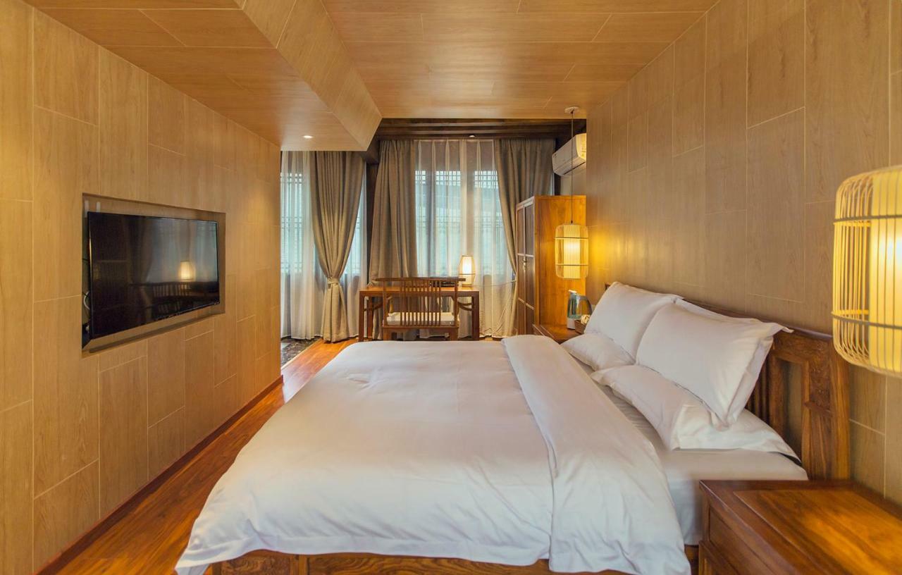 Baisha  Lijiang Qilu Garden Hotel מראה חיצוני תמונה