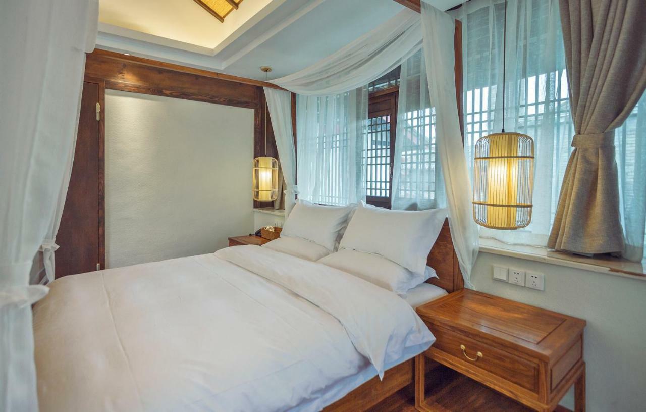 Baisha  Lijiang Qilu Garden Hotel מראה חיצוני תמונה