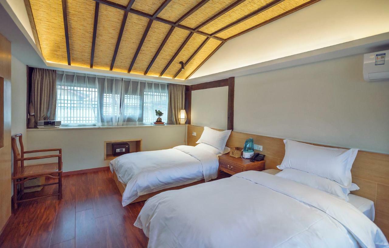 Baisha  Lijiang Qilu Garden Hotel מראה חיצוני תמונה