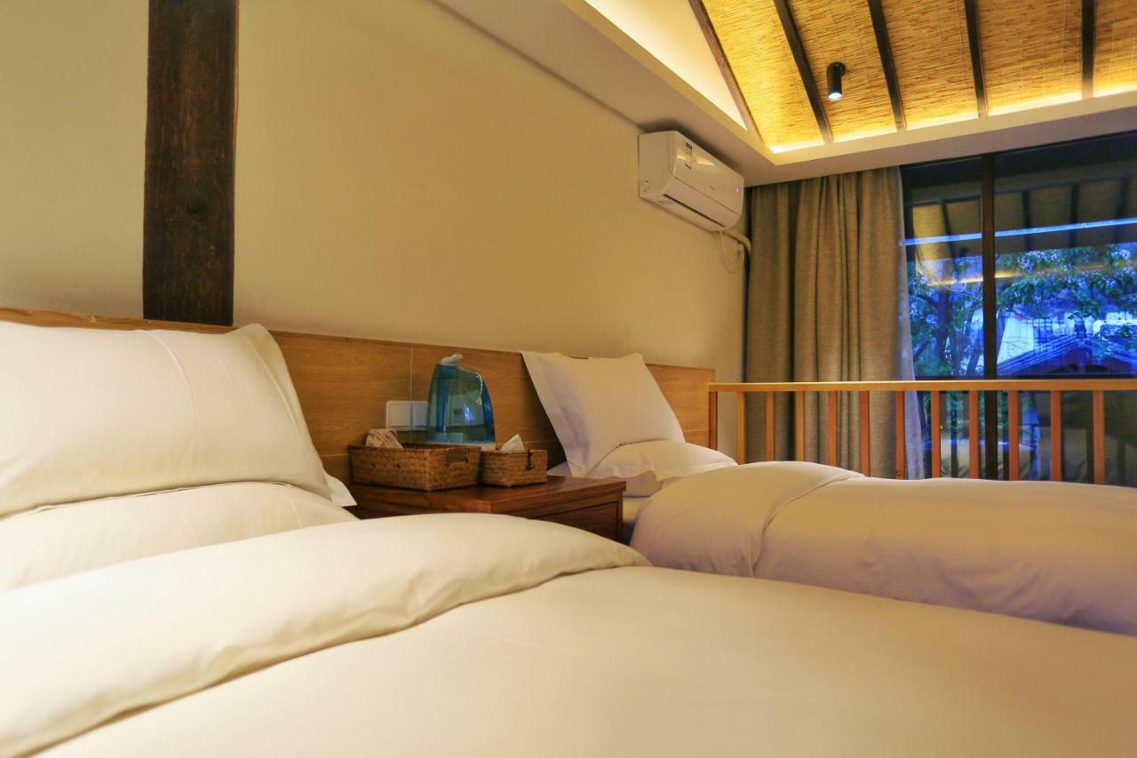 Baisha  Lijiang Qilu Garden Hotel מראה חיצוני תמונה